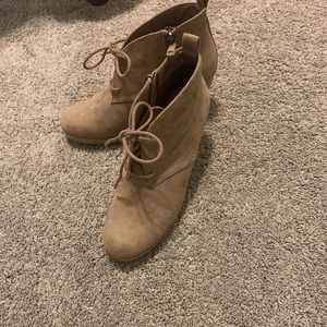 Tan wedge booties.